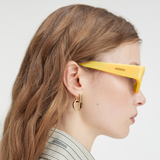 Ovalo Oval Sunglasses in Yellow by Jacquemus